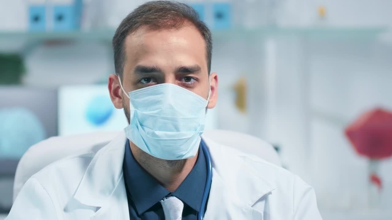 Stock Video Modern Hospital Doctor In Face Mask Noddin Animated Wallpaper - Free Download