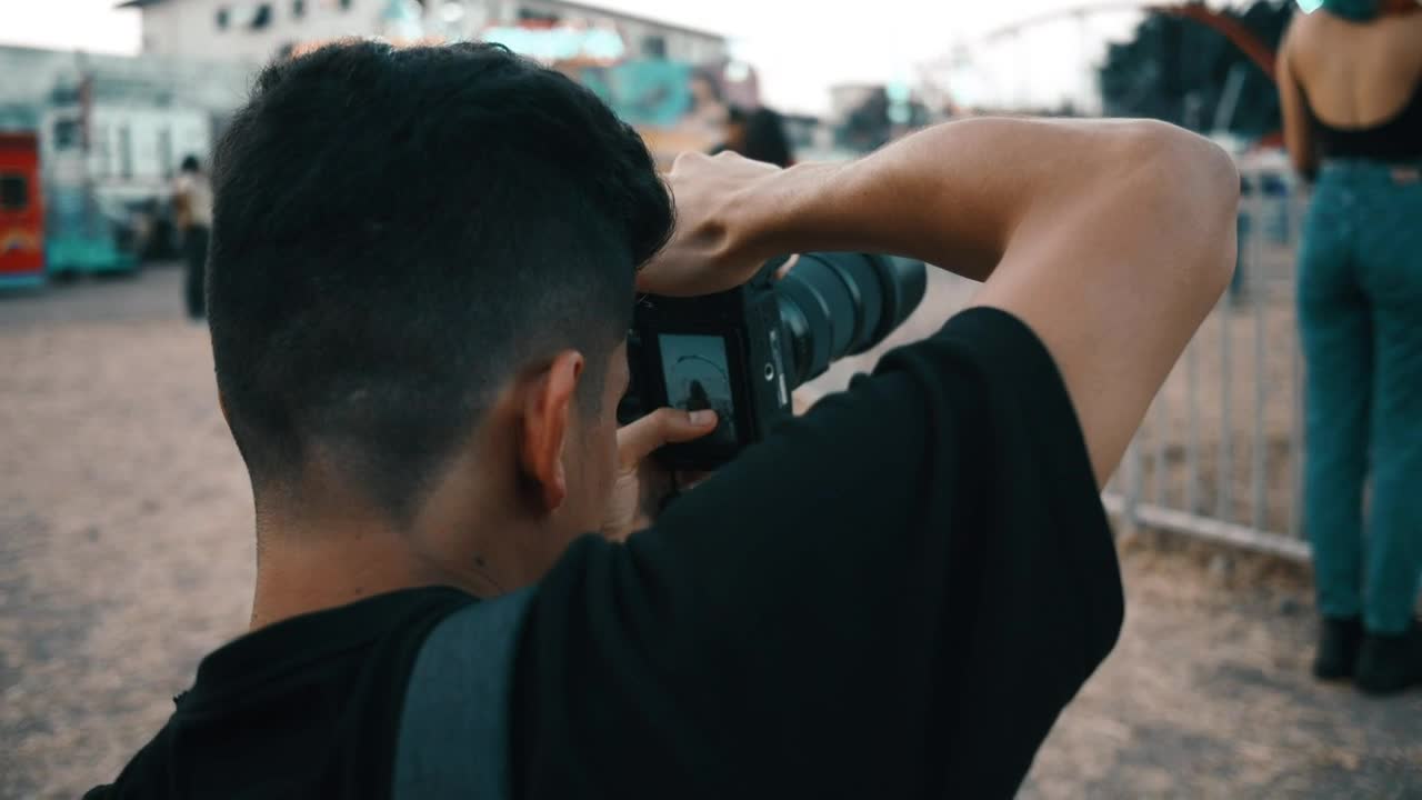 Stock Footage Urban Photographer Working At The Fair Live Wallpaper - Free Download