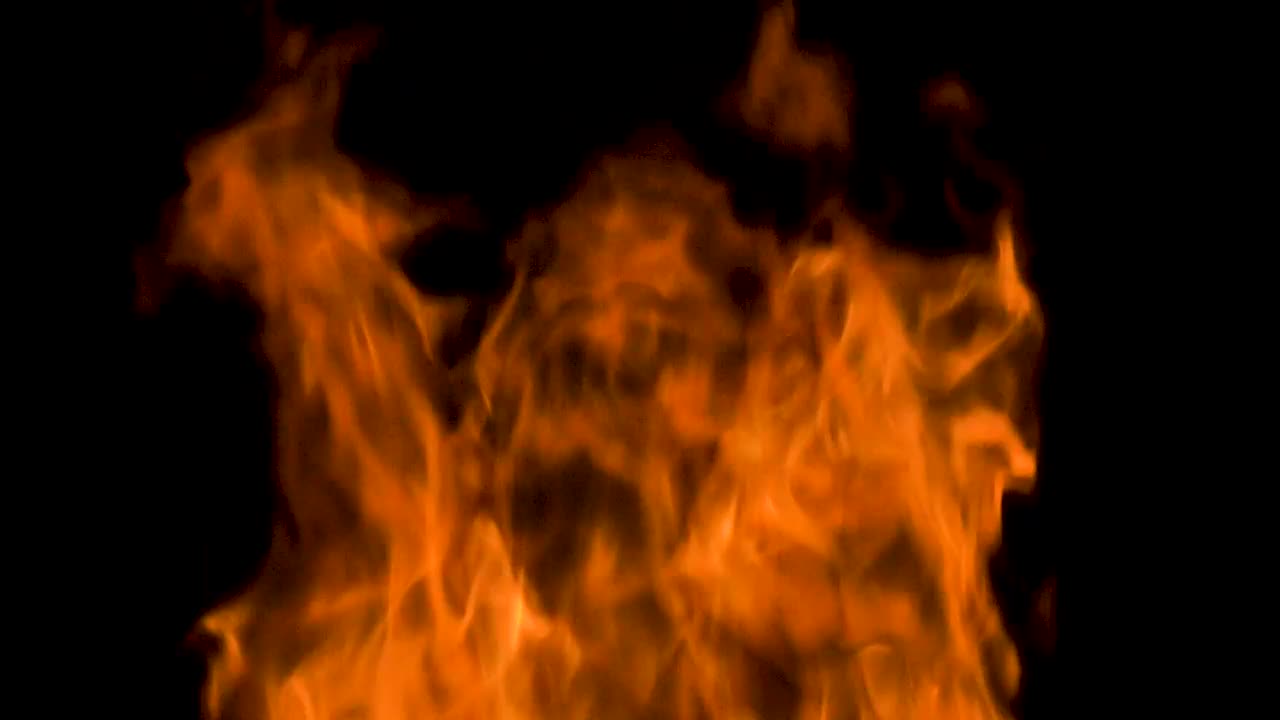 Stock Video Large Orange Flames On Black Background Animated Wallpaper - Free Download