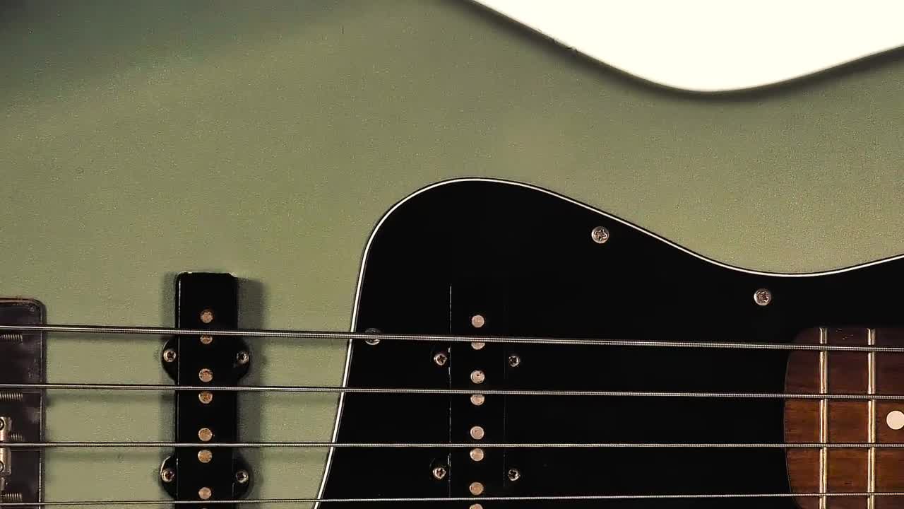 Stock Video Electric Bass Upside Down On White Background Live Wallpaper For PC - Free Download