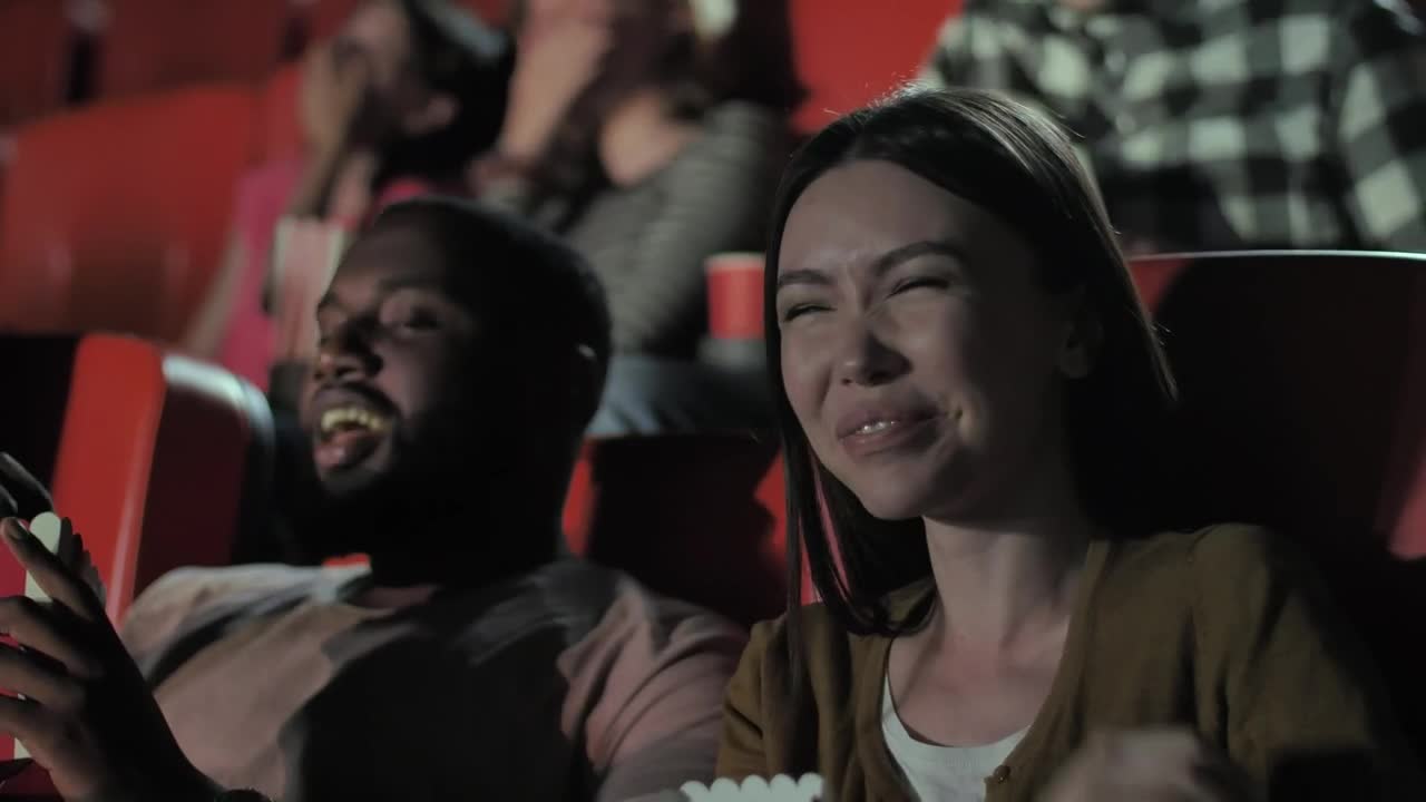 Stock Video Couple Laughing During A Comedy Film Live Wallpaper For PC - Free Download