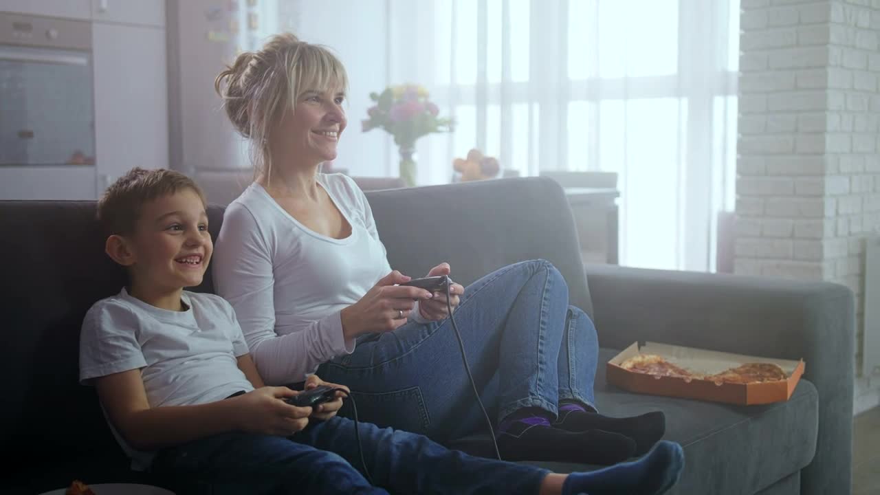 Stock Video Mother And Son Playing Video Games Togethe Animated Wallpaper - Free Download