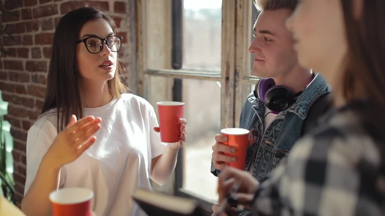 Free Video Stock Students Think And Talk About Ideas While Drinking Live Wallpaper - Free Download