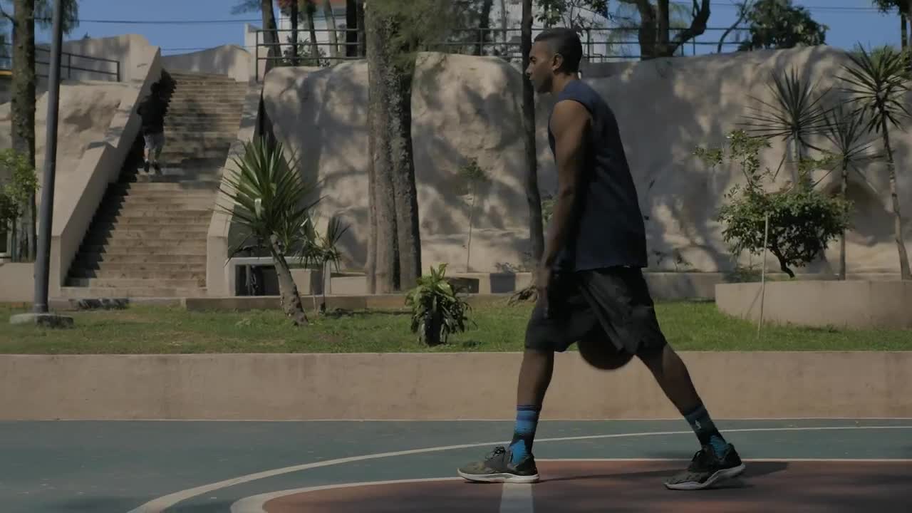 Stock Video Man Bouncing A Basketball Ball Animated Wallpaper - Free Download