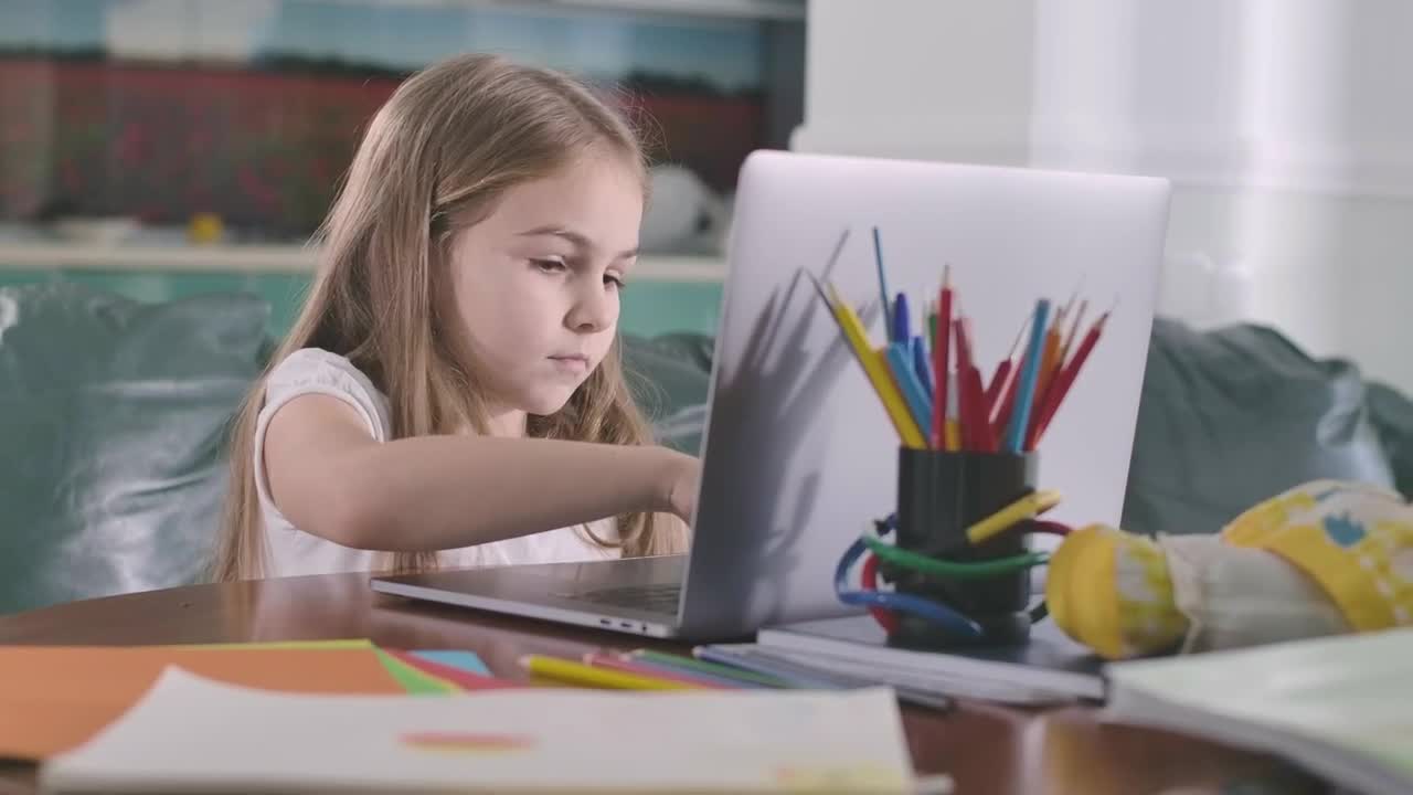 Stock Video Little Girl Studying On A Computer Animated Wallpaper - Free Download