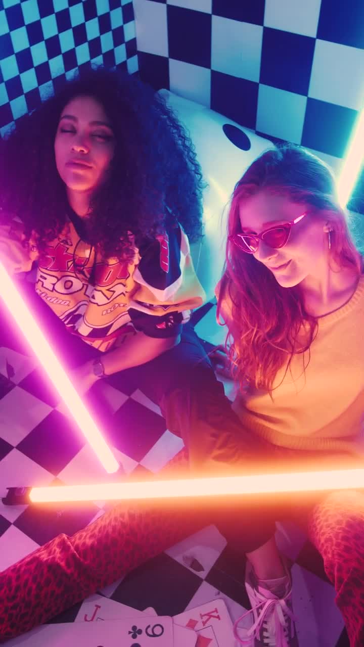Free Stock Video Two Stylish Girls Surrounded By Bars Of Light Live Wallpaper - Free Download