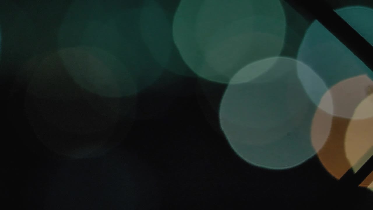 Free Stock Video Silhouette Of A Fence With Defocused Lights In The Background Live Wallpaper - Free Download