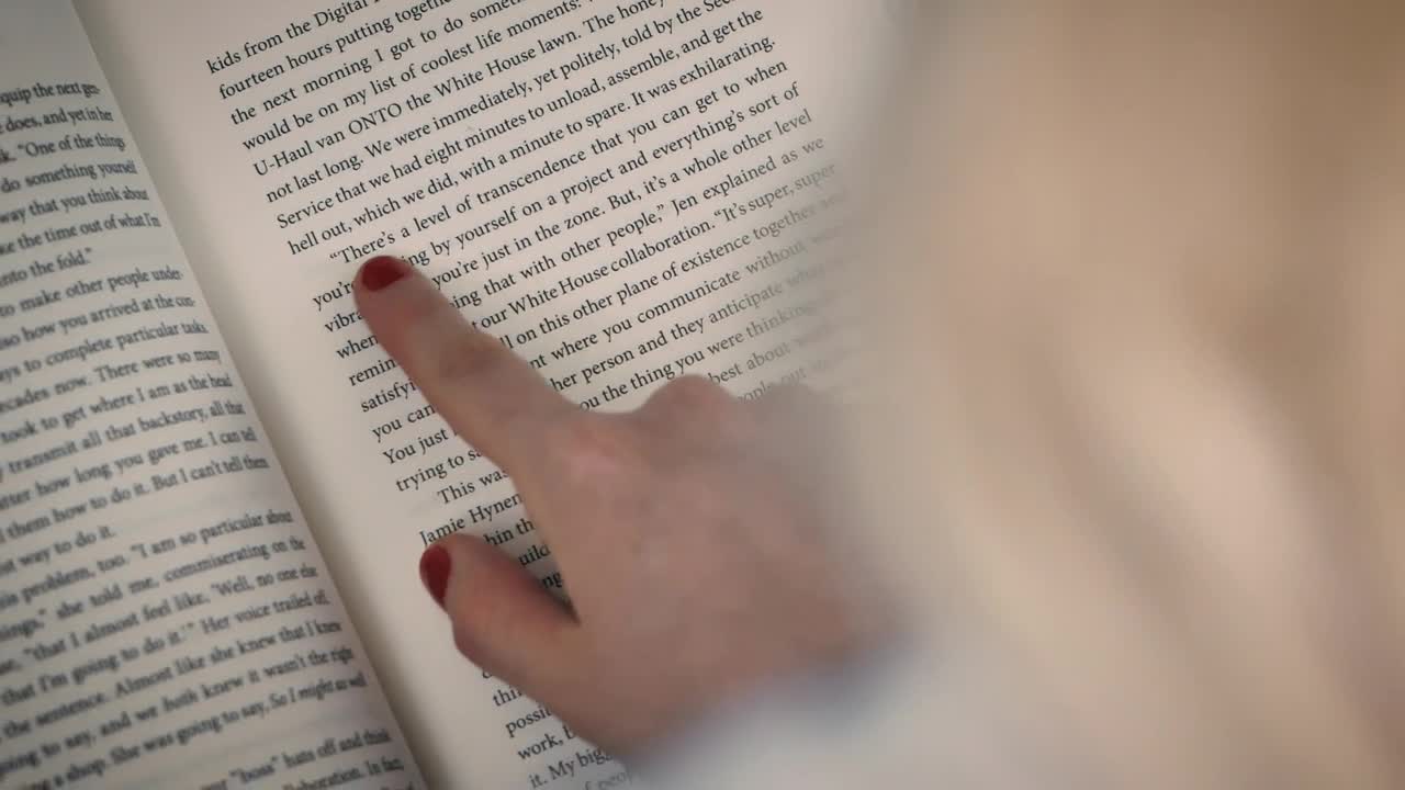 Stock Video Detailed View Of A Book Read By A Girl Live Wallpaper For PC - Free Download
