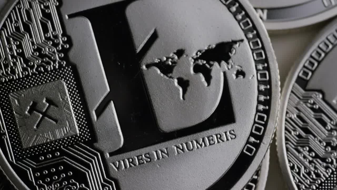 Free Video Stock texture of silver litecoin coins slowly rotating Live Wallpaper - Free Download