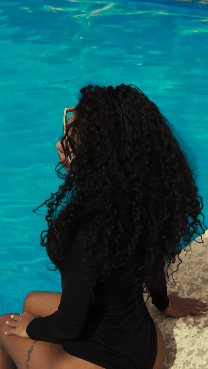 Stock Video Curly Haired Girl At A Pool Wearing Sunglasses Live Wallpaper For PC - Free Download