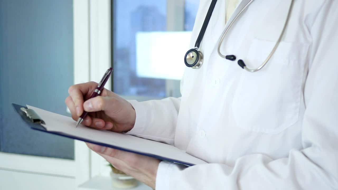 Stock Video Doctor Writing On Medical Record Live Wallpaper For PC - Free Download