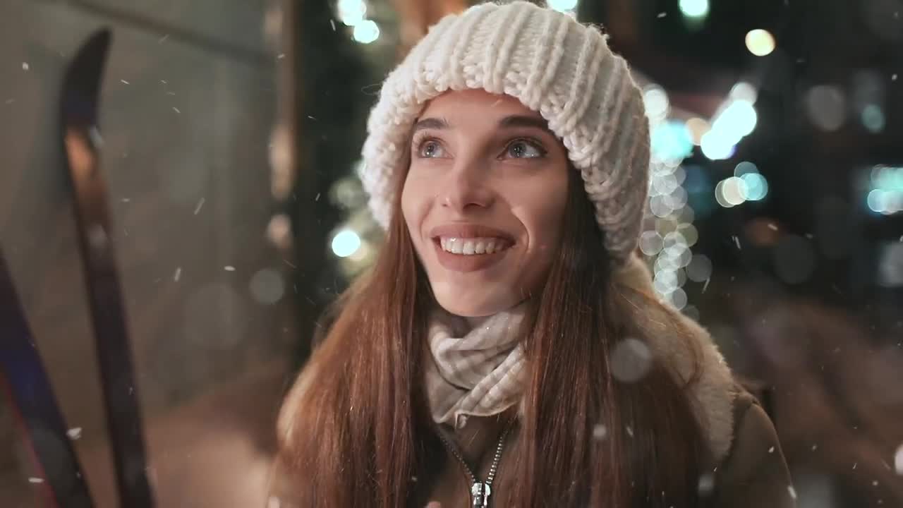Video Stock Cinematic Of Woman Warming Hands In Nighttime Winter Town Live Wallpaper For PC - Free Download