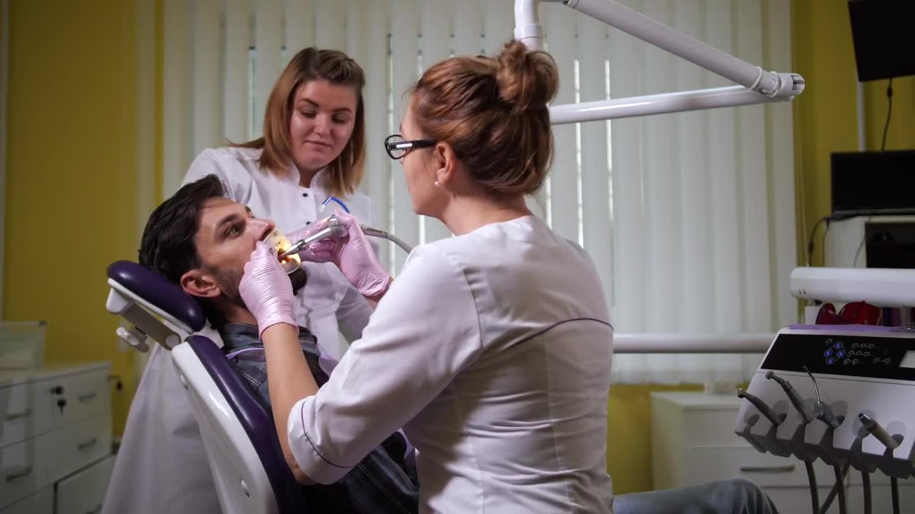 Stock Video Dentist Cleaning Teeth After Treatment Live Wallpaper For PC - Free Download