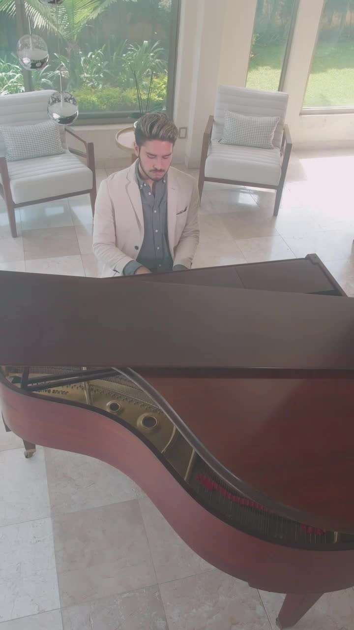Free Stock Video Young Man Playing The Piano In A Stylish Lobby Live Wallpaper - Free Download