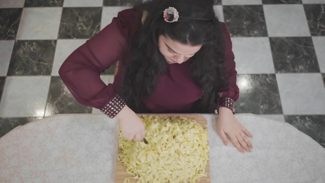 Free Video Stock top view of obese woman eating huge dish of pasta Live Wallpaper - Free Download