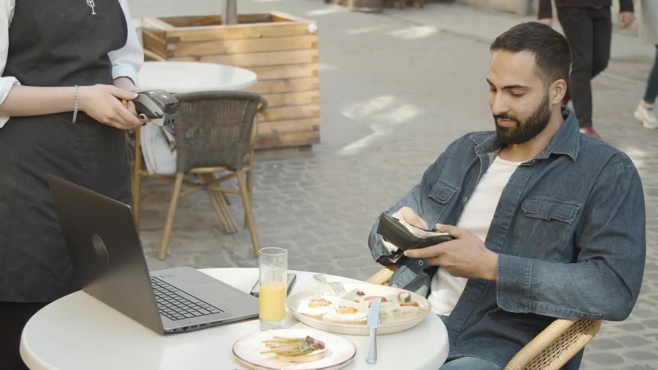 Stock Video Man Uses Credit Card On Pos To Pay For Mea Animated Wallpaper - Free Download
