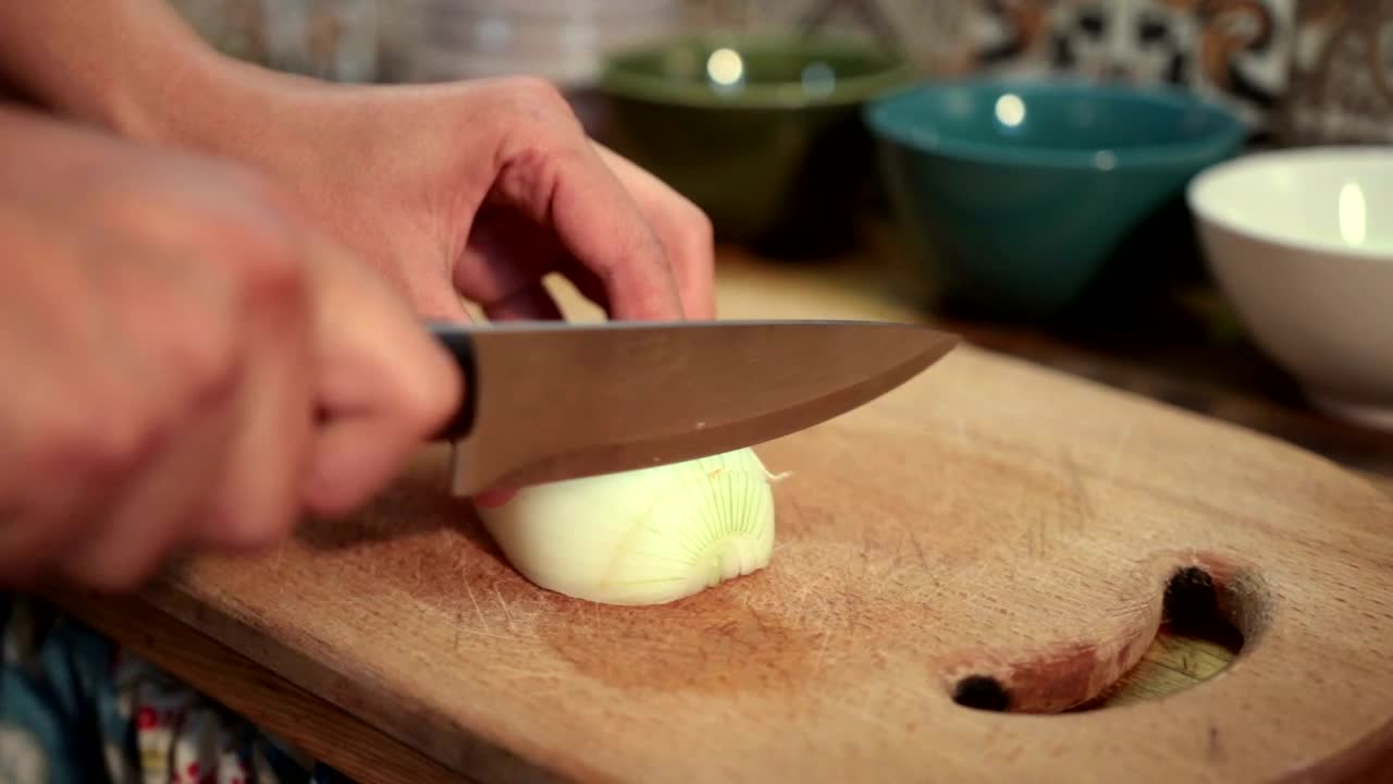 Stock Video Cutting Up An Onion For A Stew Live Wallpaper For PC - Free Download