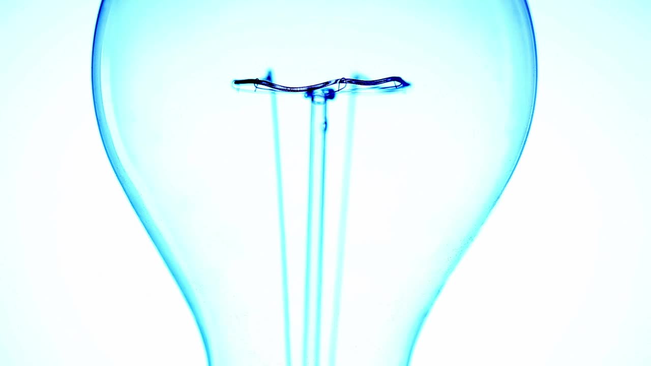 Stock Video Incandescent Light Bulb Turning On Animated Wallpaper - Free Download