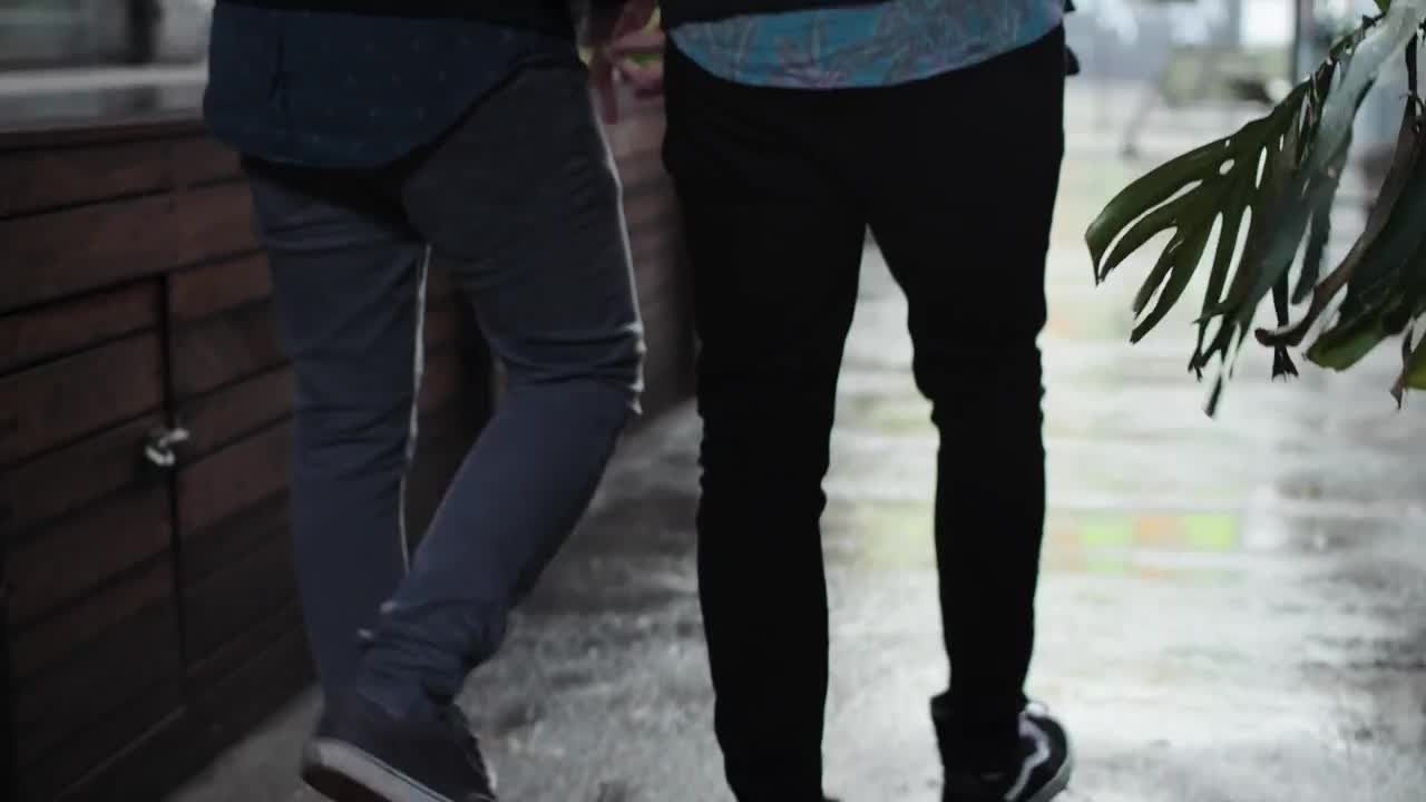 Stock Video Couple Walking In The Street Using An Umbrella Live Wallpaper For PC - Free Download