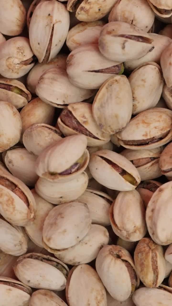 Video Stock Piled Up Pistachios Spinning Seen Up Close Live Wallpaper Free - Free Download
