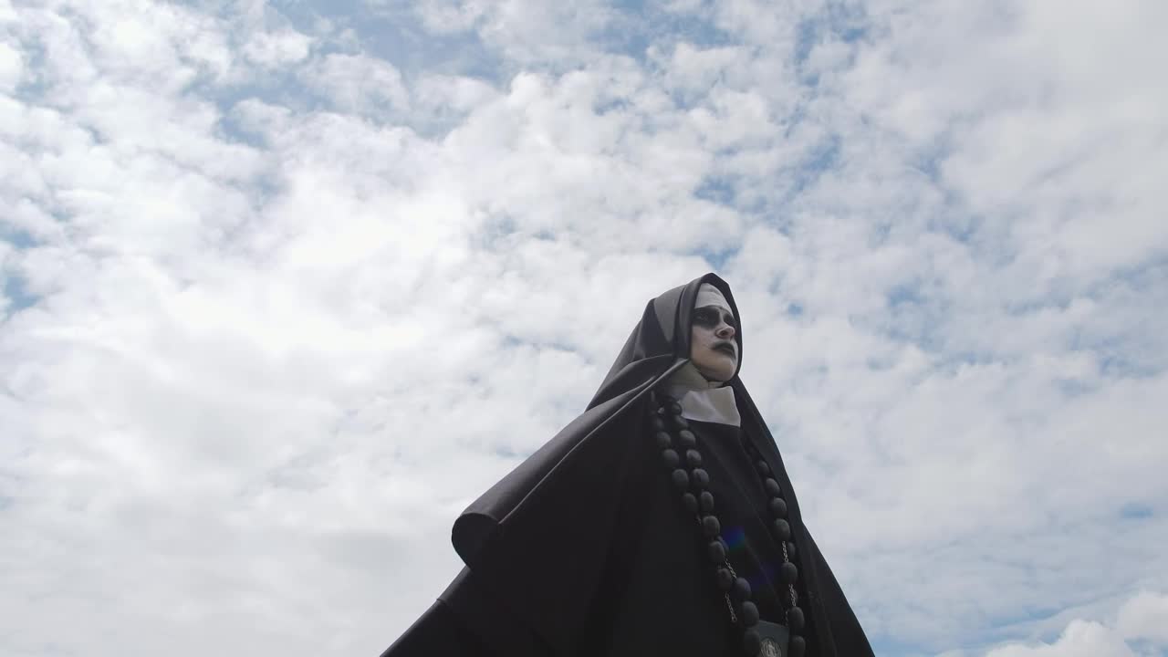 Free Stock Video Scary Ghost Nun Outside On A Sunny Day Live Wallpaper - Free Download