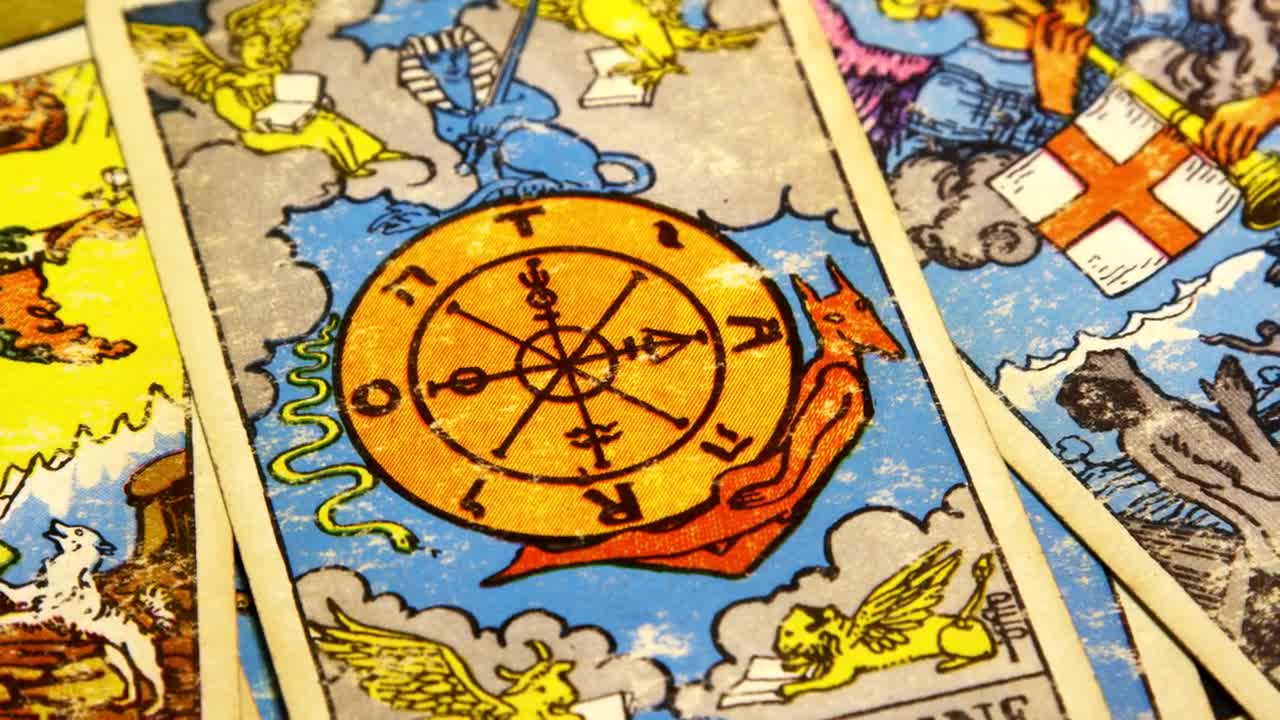 Free Video Stock tarot cards spread across a table Live Wallpaper - Free Download