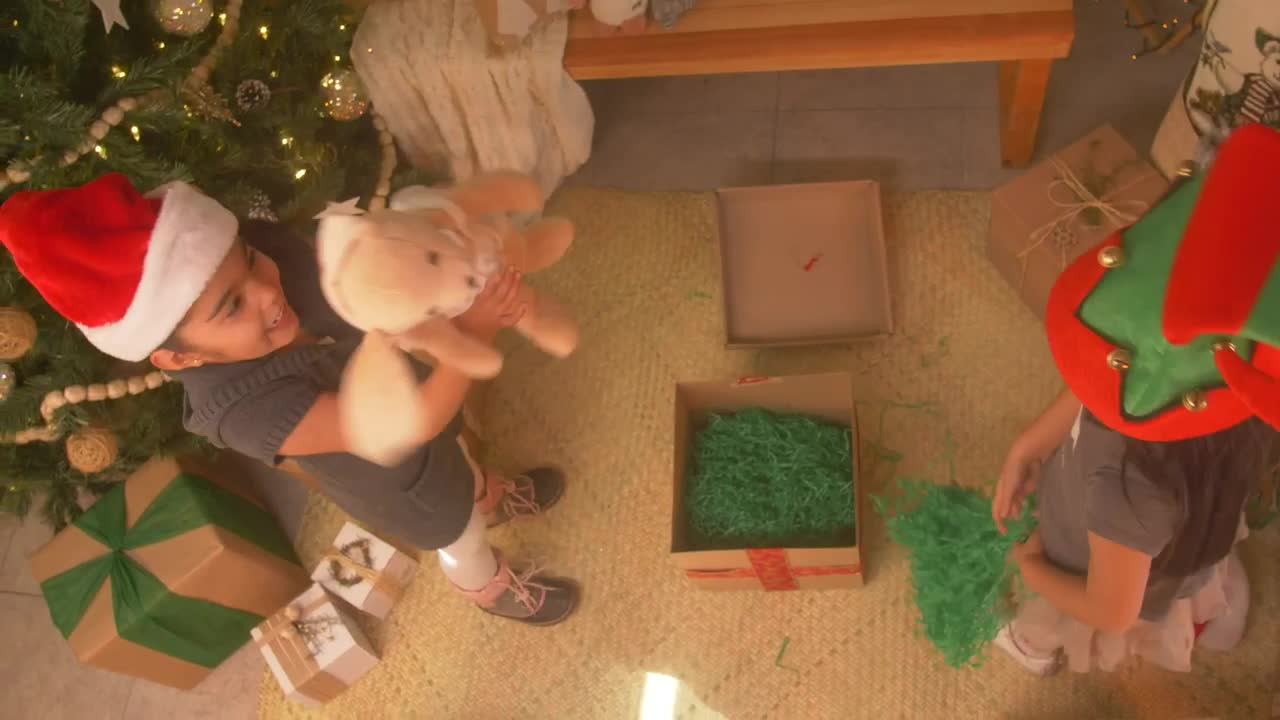Stock Video Little Sisters Playing Excited On Christmas Day Animated Wallpaper - Free Download