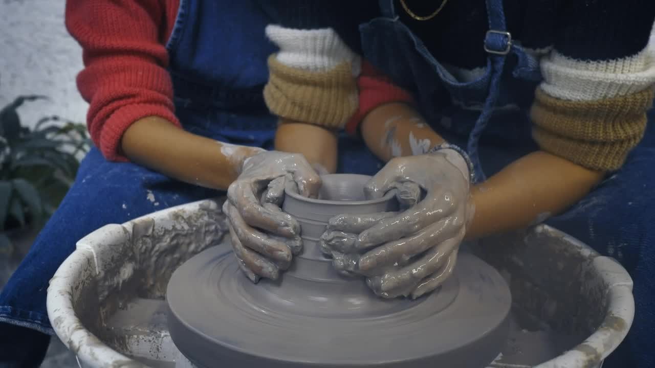 Stock Video Lgbtq Couple Of Girls Making A Clay Vase Together Animated Wallpaper - Free Download