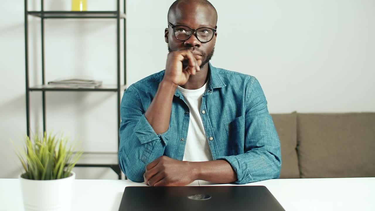 Stock Video Man Thinks What To Do Before Starting Wor Animated Wallpaper - Free Download
