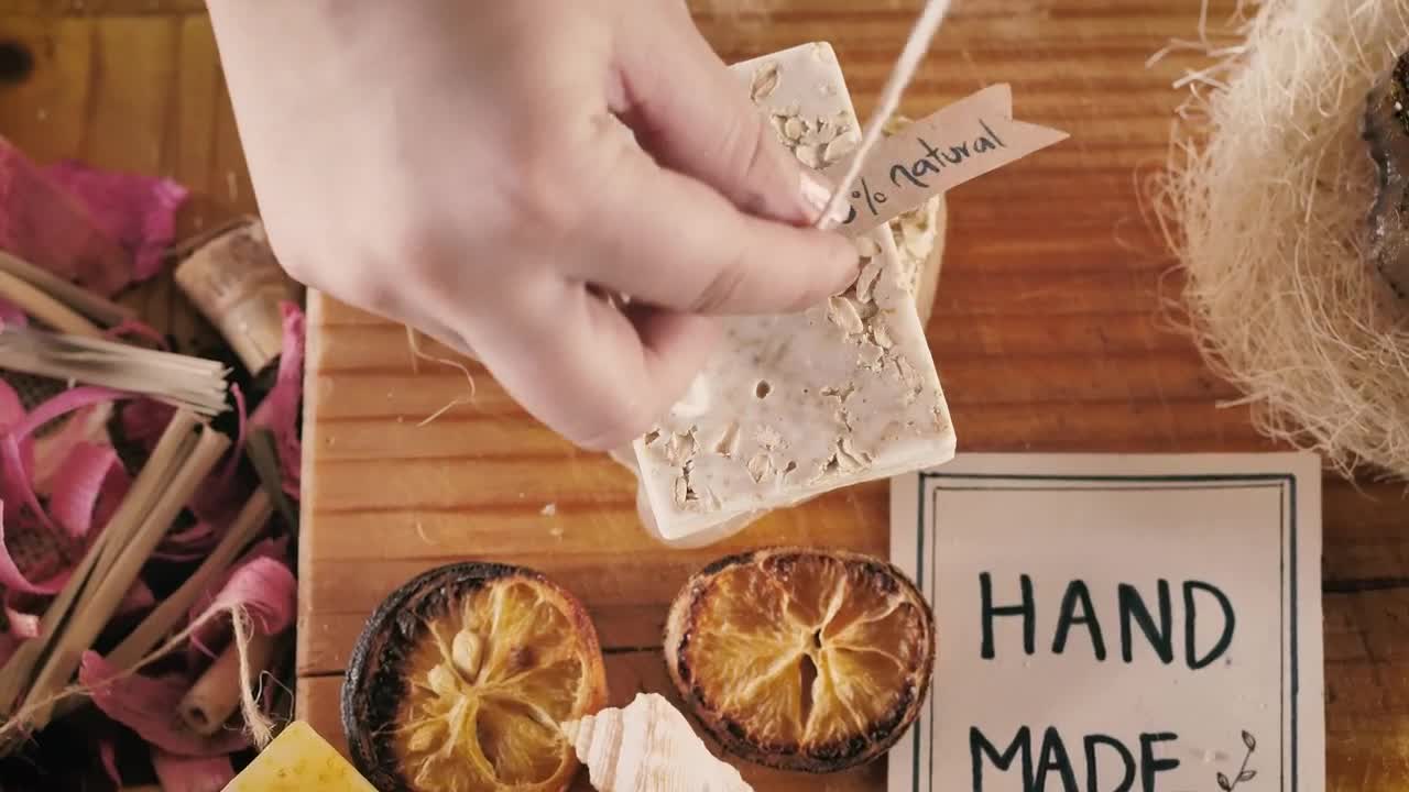 Stock Video Hands Labeling A Handmade Soap Animated Wallpaper - Free Download