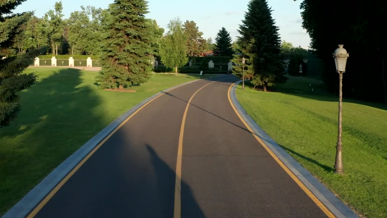 Stock Video Couple Casting Long Shadows As They Ride Bikes Live Wallpaper For PC - Free Download