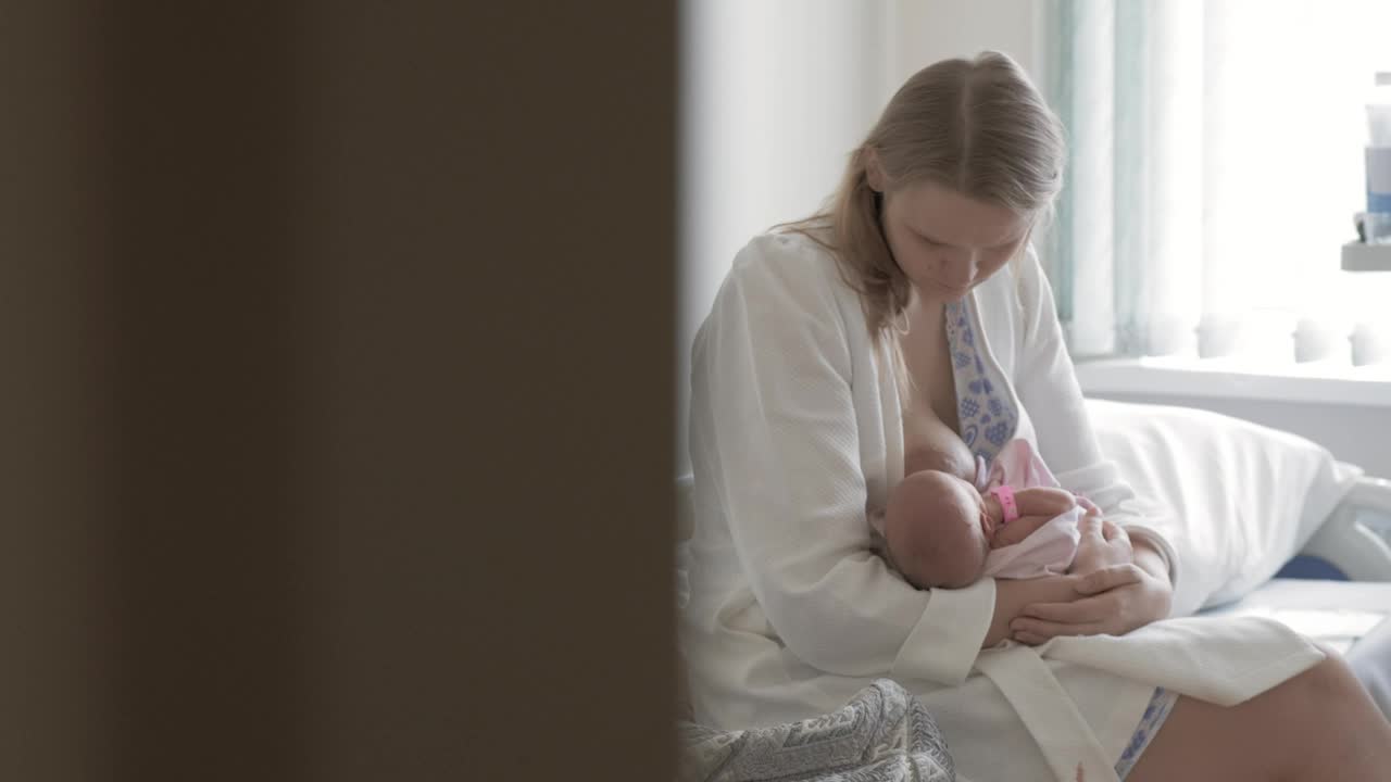 Stock Video Mother Breastfeeding Her Newbor Animated Wallpaper - Free Download