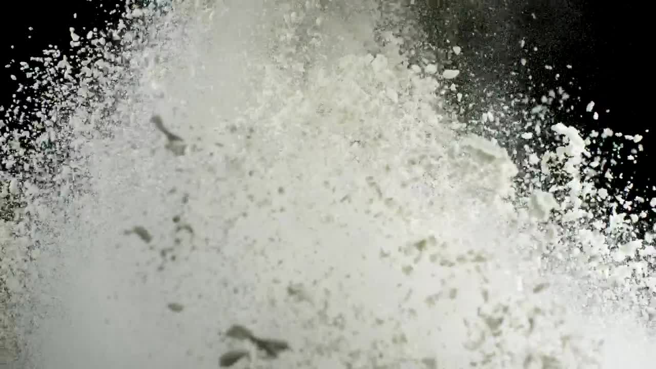 Free Video Stock Splash Of White Powder Against A Dark Screen Live Wallpaper - Free Download