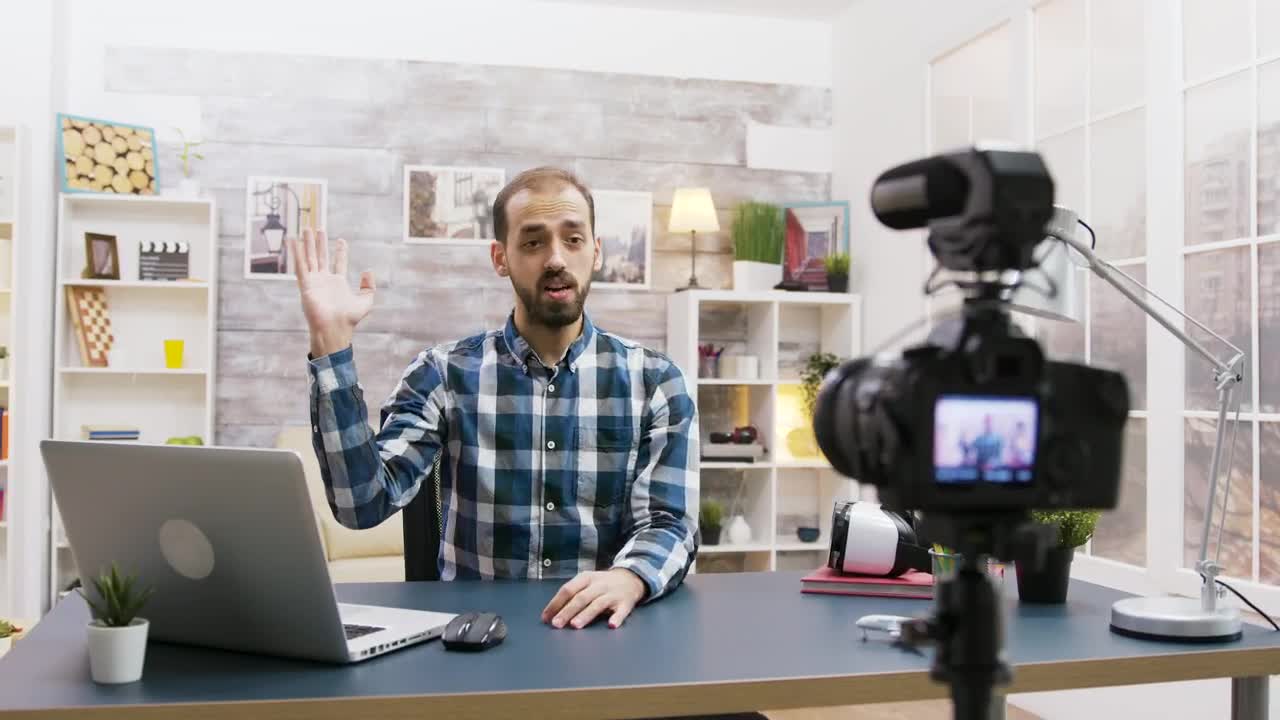 Free Video Stock tech vlogger reminds people to subscribe with gestures Live Wallpaper - Free Download