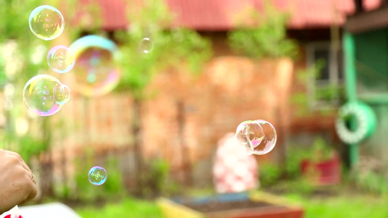 Stock Video Making Bubbles With Soap Animated Wallpaper - Free Download