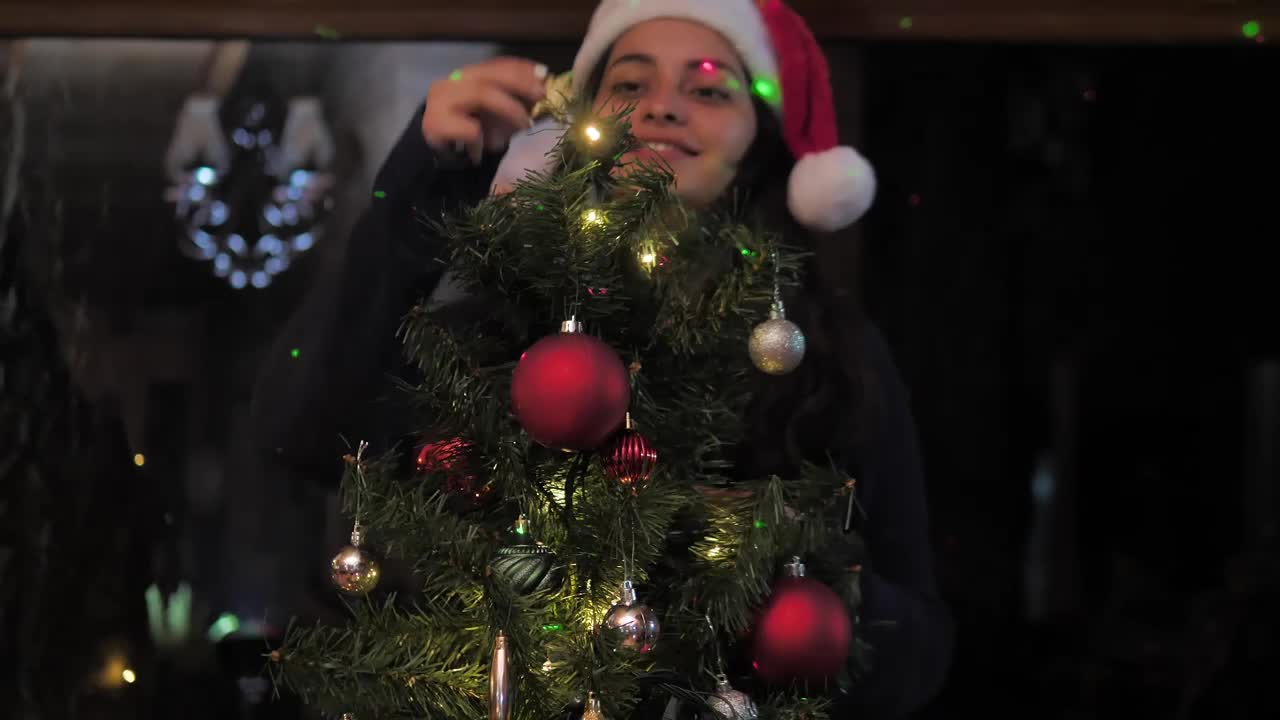 Free Stock Video Woman Decorating A Small Christmas Tree Live Wallpaper - Free Download