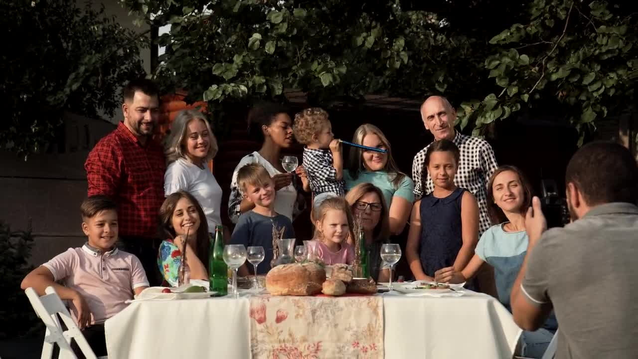 Free Video Stock taking a family group photo in the backyard Live Wallpaper - Free Download