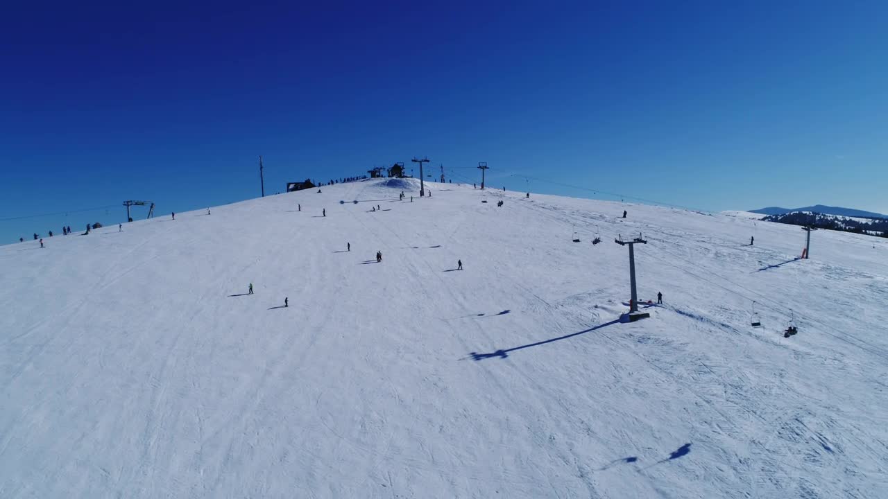 Free Video Stock Skiers On A Practice Mountain Aerial View Live Wallpaper - Free Download