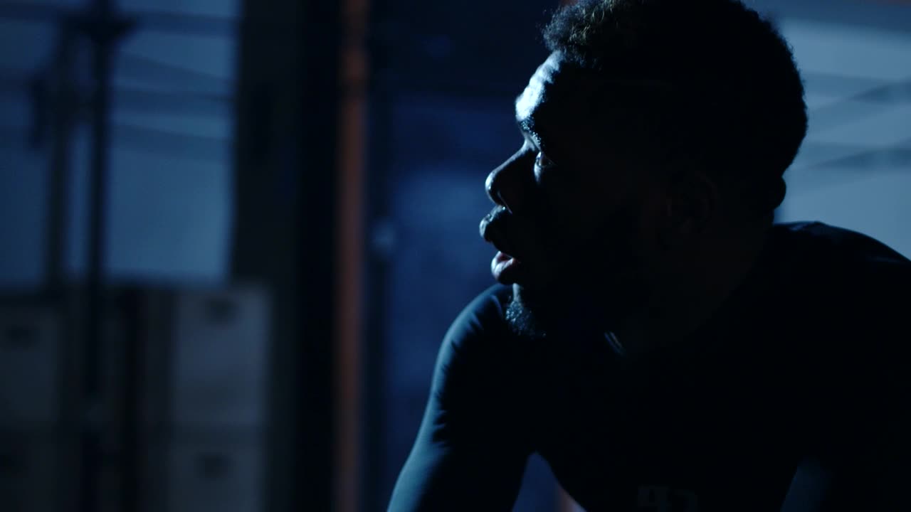 Free Video Stock tired athlete catching his breath at a gym Live Wallpaper - Free Download