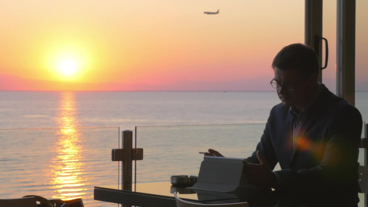 Video Stock Businessman Smoking And Looking At A Plane Live Wallpaper For PC - Free Download