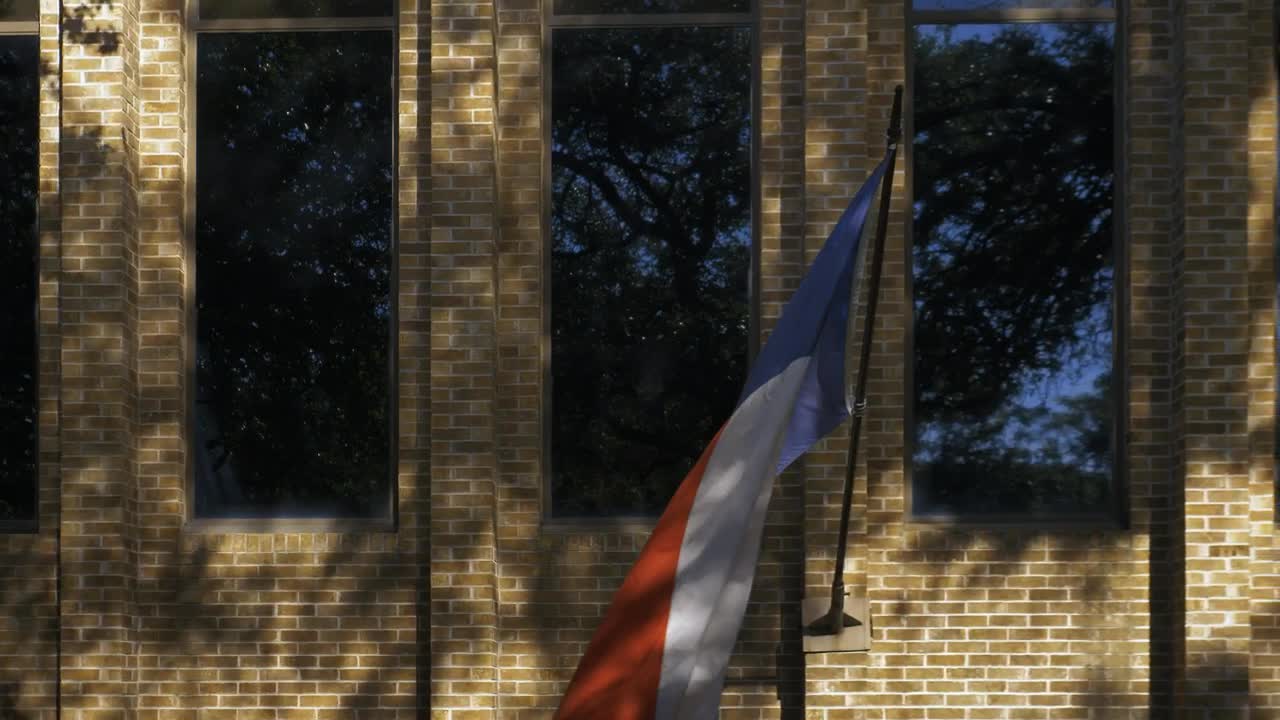 Free Video Stock texas flag waving on a building wall Live Wallpaper - Free Download
