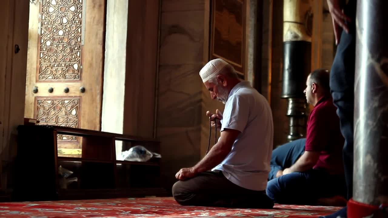 Stock Video Men Praying Inside A Mosque On The Floo Animated Wallpaper - Free Download