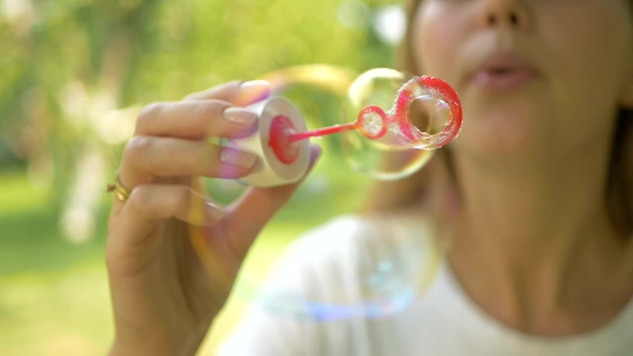 Stock Video Person Blowing Soap Bubbles In The Outside Live Wallpaper - Free Download