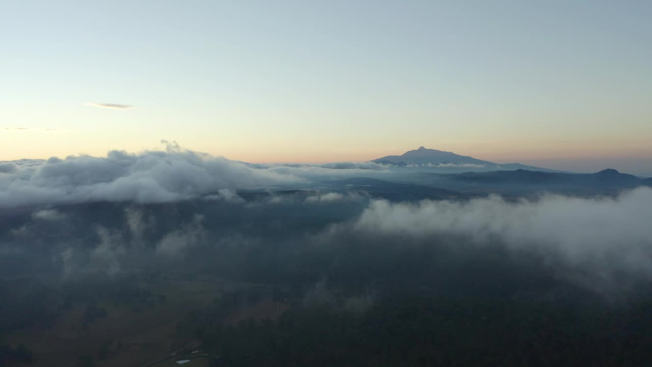 Stock Video Flying Over A Mountainous Landscape Covered With Clouds Live Wallpaper For PC - Free Download
