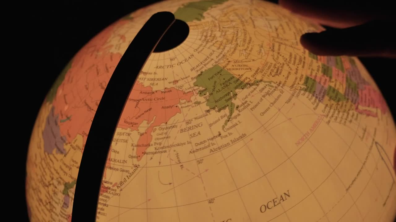 Stock Video Hand Turning A Luminous Earth Globe In The Dark Live Wallpaper For PC - Free Download
