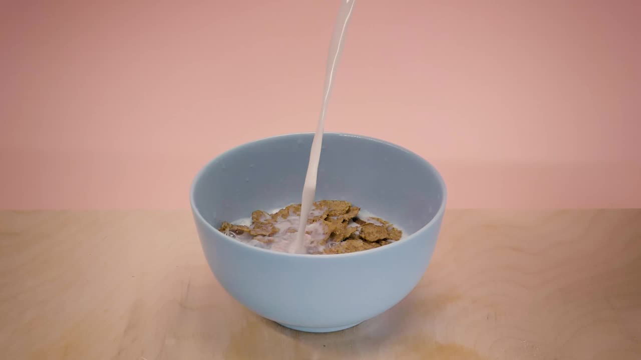 Video Stock Pouring Milk Into A Bowl With Chocolate Flavored Cereal Live Wallpaper Free - Free Download