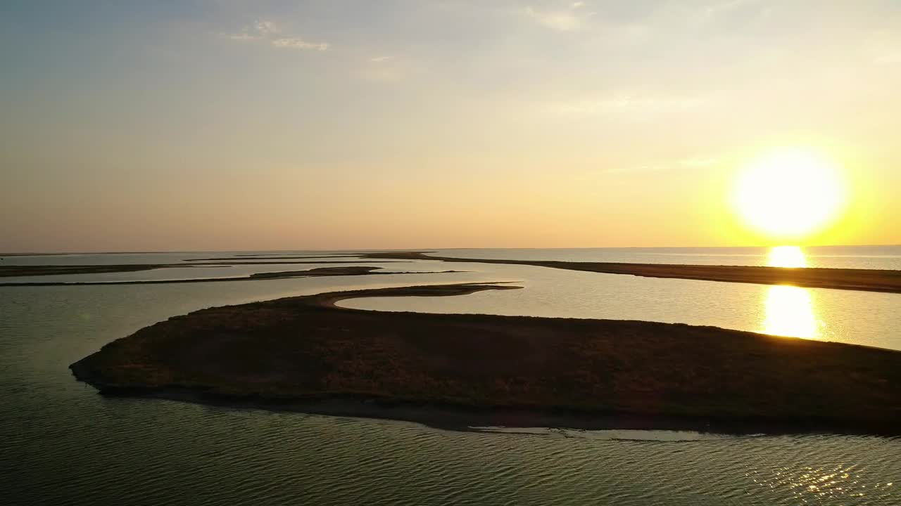 Stock Video Irregular Landforms In The Sea During Sunset Animated Wallpaper - Free Download