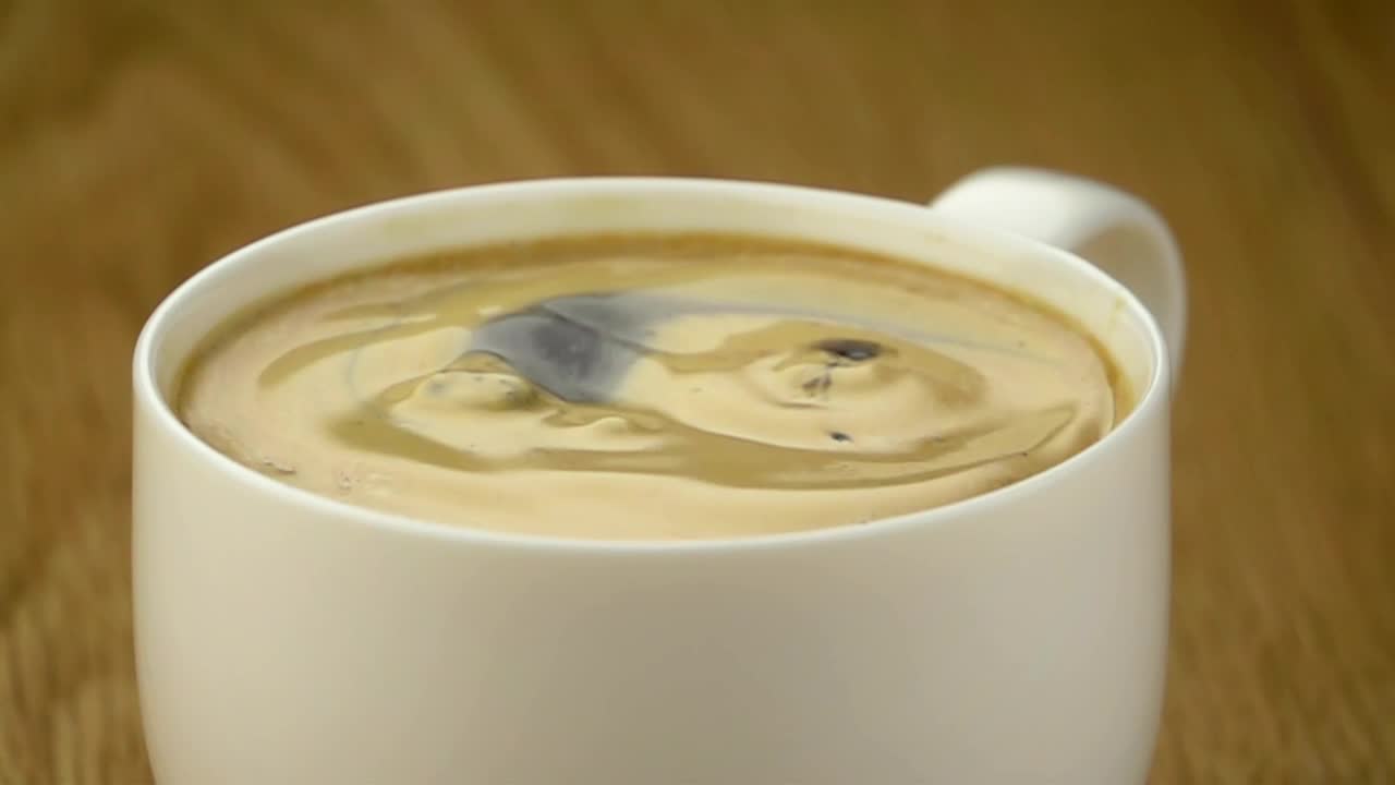 Stock Video Coffee Bean Falling Into A Cup Of Coffee Live Wallpaper For PC - Free Download