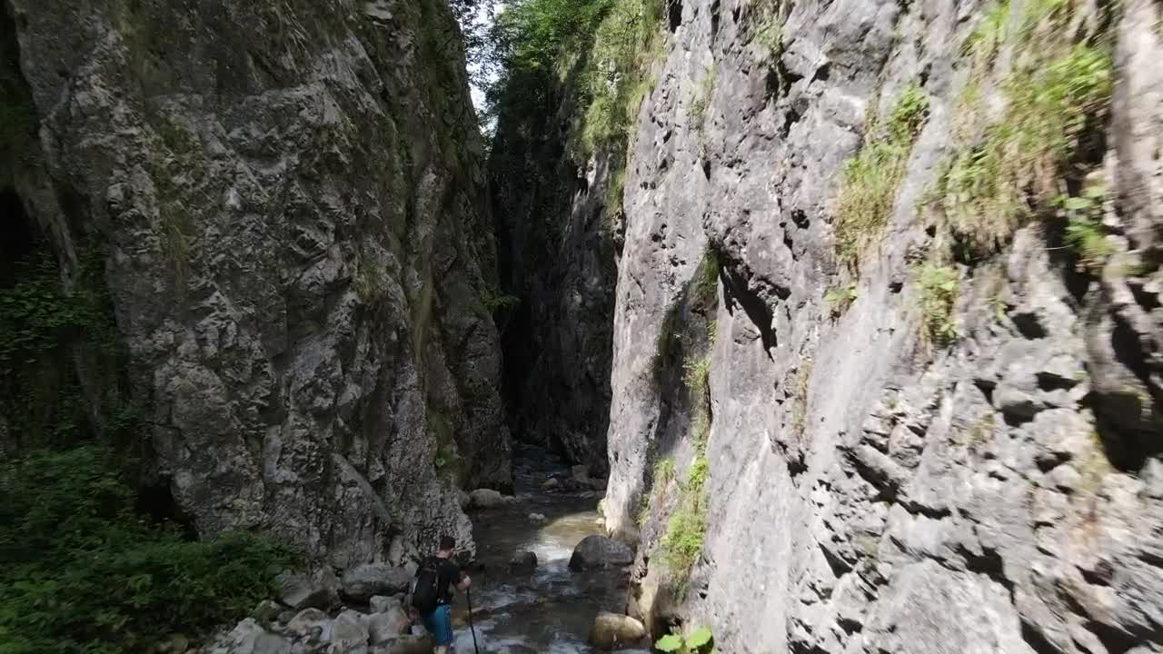 Stock Video Man Hiking In A Canyon River Animated Wallpaper - Free Download