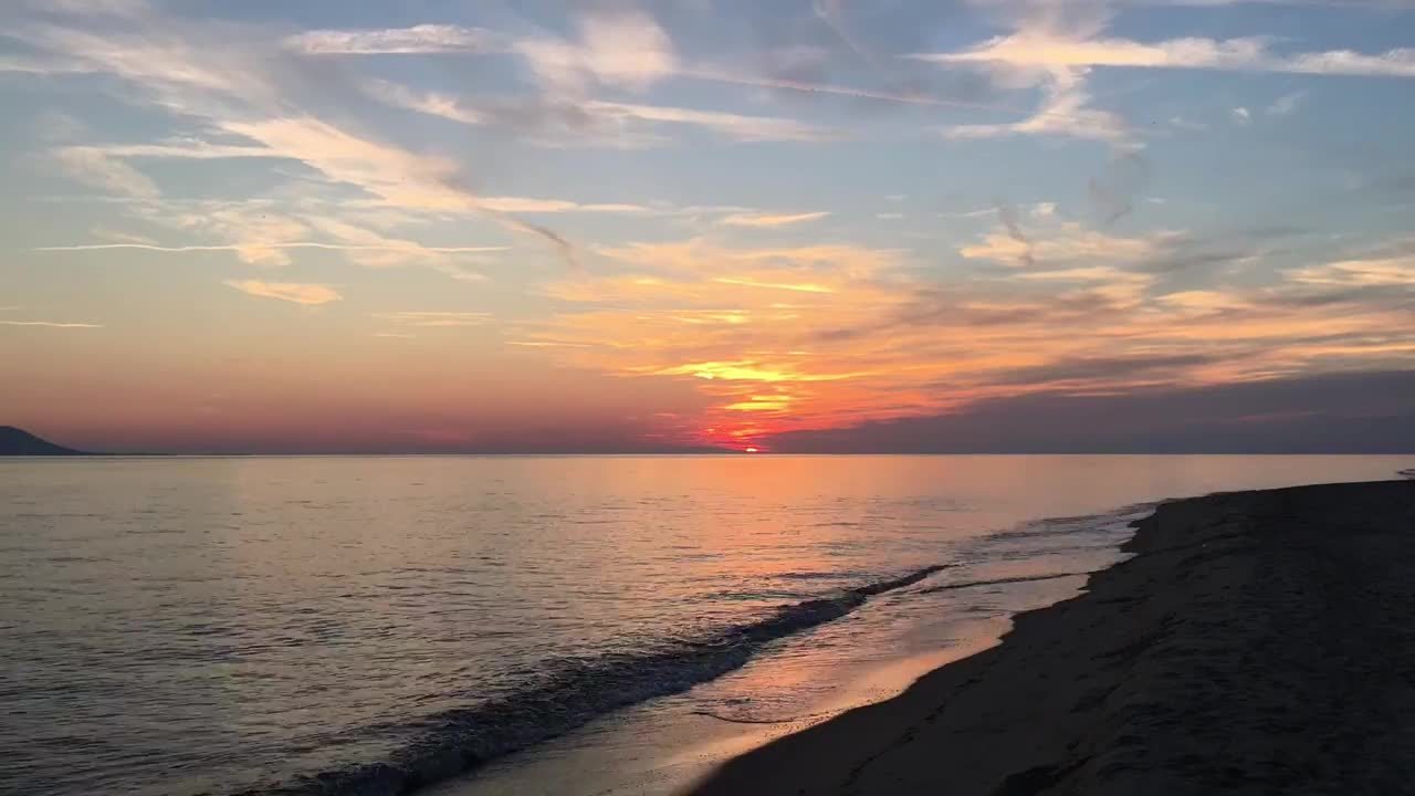 Free Video Stock the sunset on a empty beach Live Wallpaper - Free Download